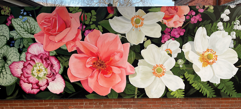 Outdoor photo of a painted mural of flowers